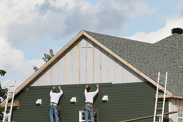 Professional Siding technician working in Akron, IN